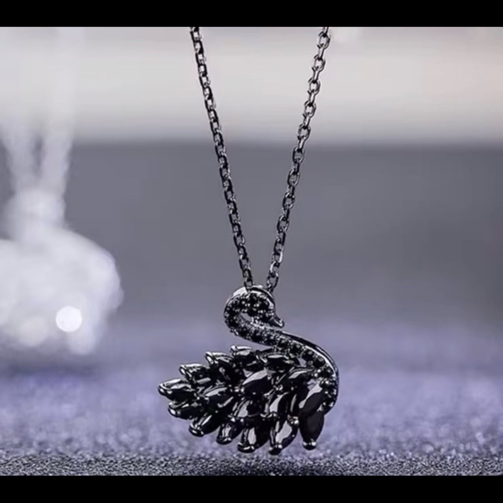 - Simulated diamond finish black swarovski elements swan pendant necklace